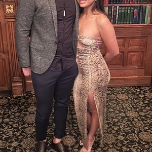 worn once. WEAR 2 WAYS. long dress. high slit. snake print. size small.